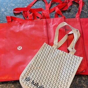 Lululemon Athletica Vibrant Red and Neutral Tote Set 4 medium and 1 small